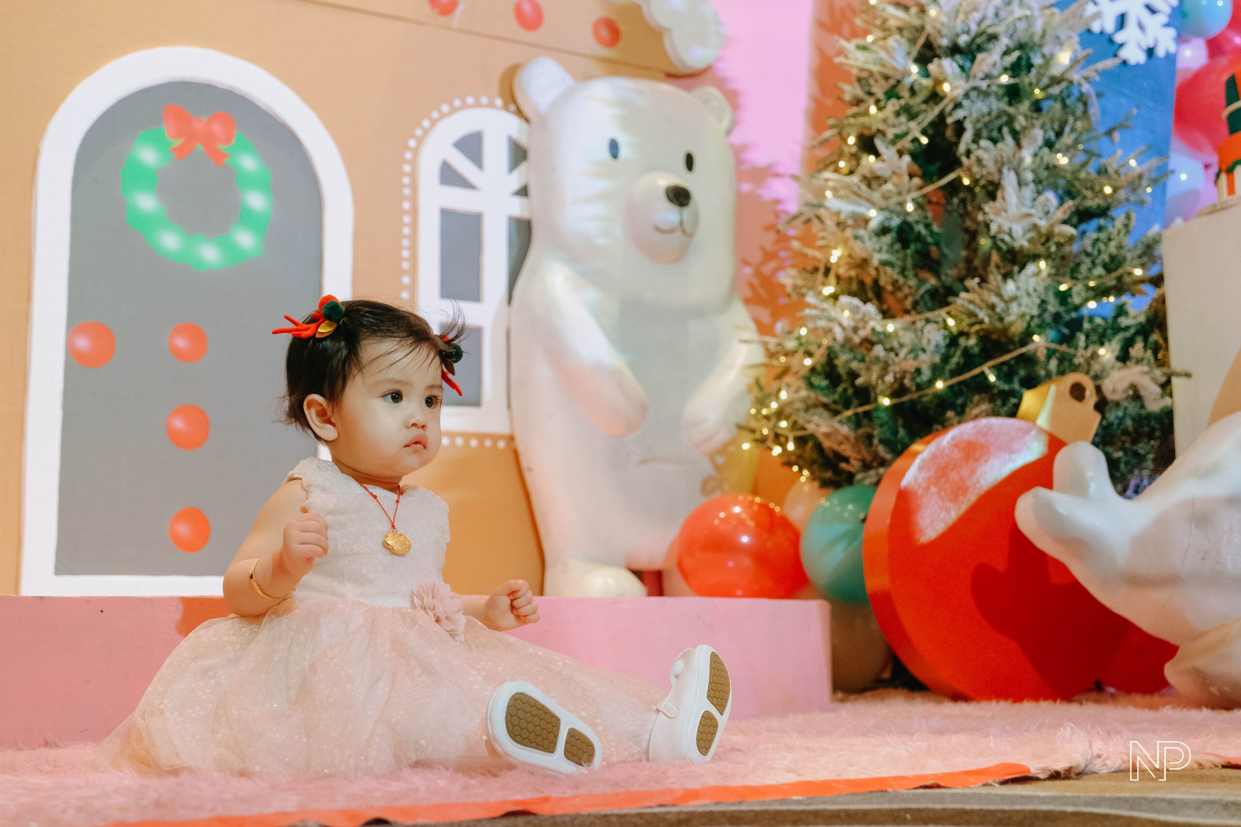 Christmas themed kids' party decor with colorful decorations, festive lights, and playful holiday elements. Expert event styling in Metro Manila, Philippines, featuring Christmas trees, Santa Claus, reindeer, and fun holiday-themed activities. Perfect for children's birthday parties, family gatherings, and festive kids' events.