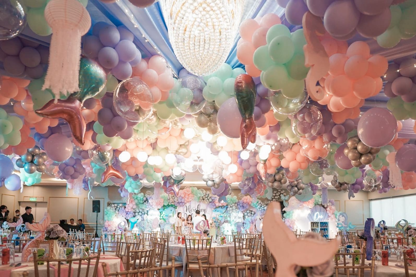 Under the Sea themed party decor featuring ocean-inspired elements, mermaid tails, seashells, and aquatic colors. Professional event stylist in Metro Manila, Philippines, specializing in underwater birthday themes, creative kids' party styling, and magical undersea celebrations. Perfect for mermaid parties, toddler birthdays, and ocean-themed events - Party Curators