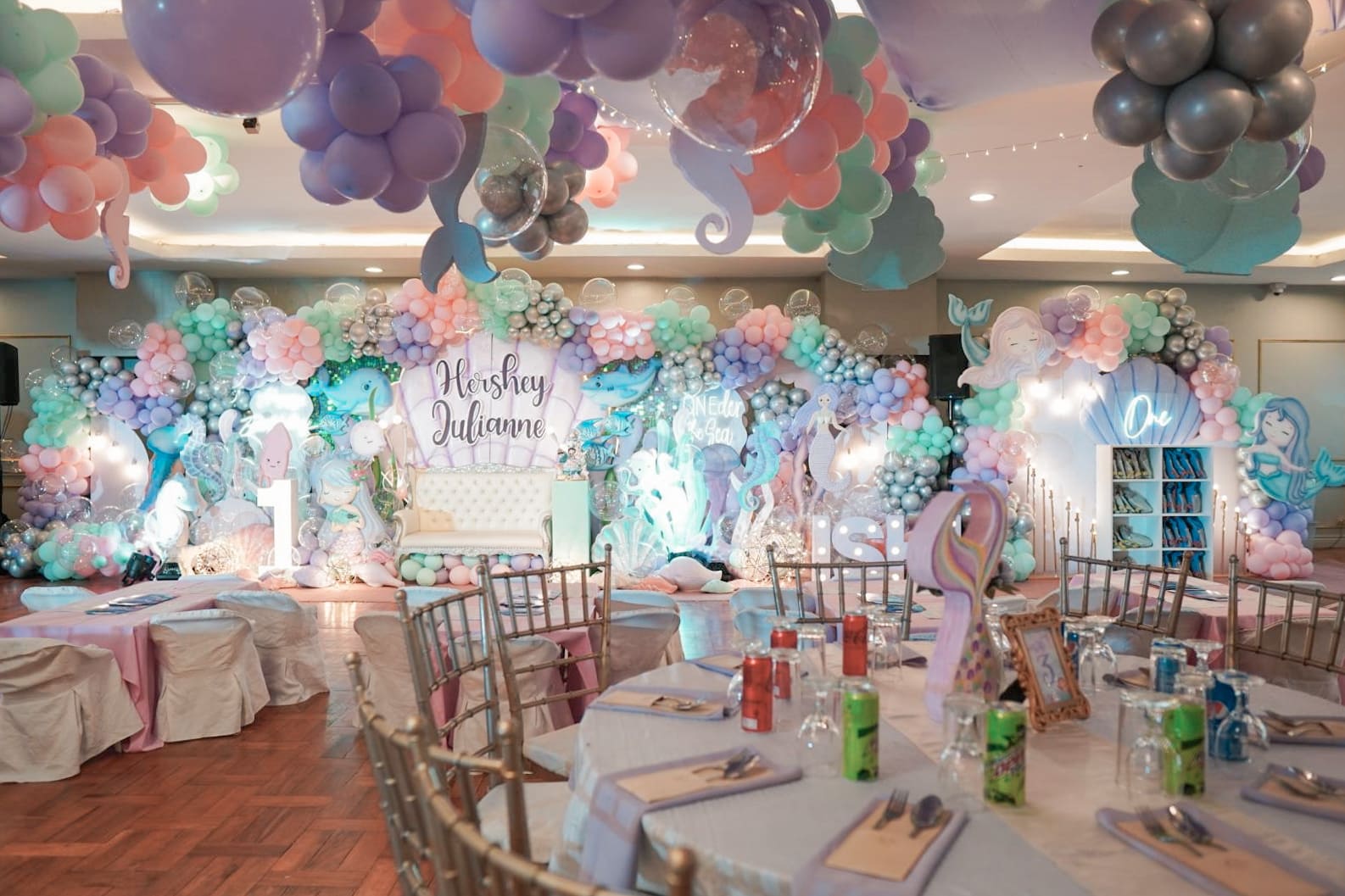 Under the Sea themed party decor featuring ocean-inspired elements, mermaid tails, seashells, and aquatic colors. Professional event stylist in Metro Manila, Philippines, specializing in underwater birthday themes, creative kids' party styling, and magical undersea celebrations. Perfect for mermaid parties, toddler birthdays, and ocean-themed events - Party Curators