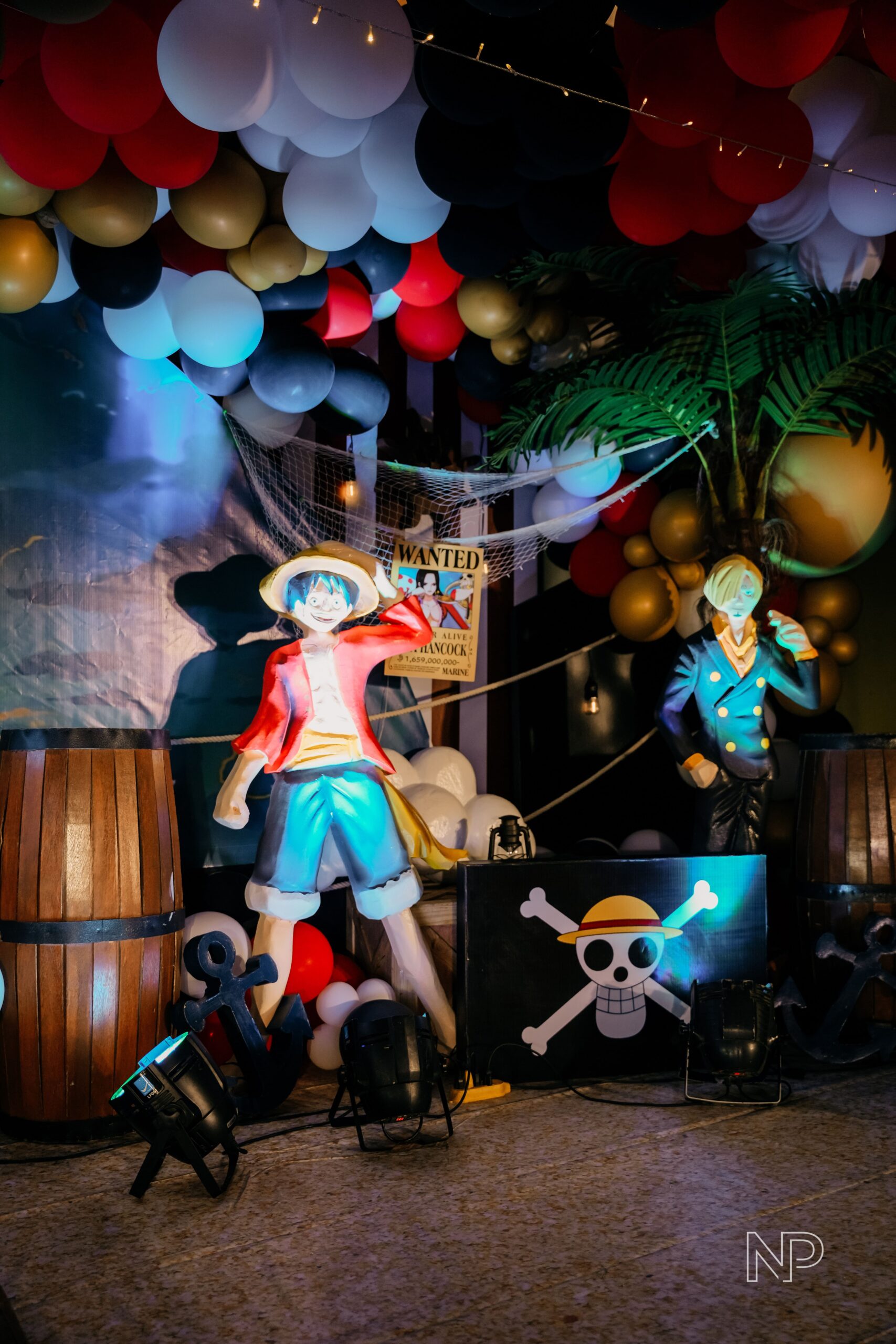 One Piece themed party decor featuring pirate ship backdrops, anime character cutouts, and nautical-inspired styling. Expert event stylist in Metro Manila, Philippines, specializing in anime-themed parties, custom birthday setups, and creative event styling for kids and teens. Perfect for One Piece fans, children’s parties, and anime-inspired celebrations.