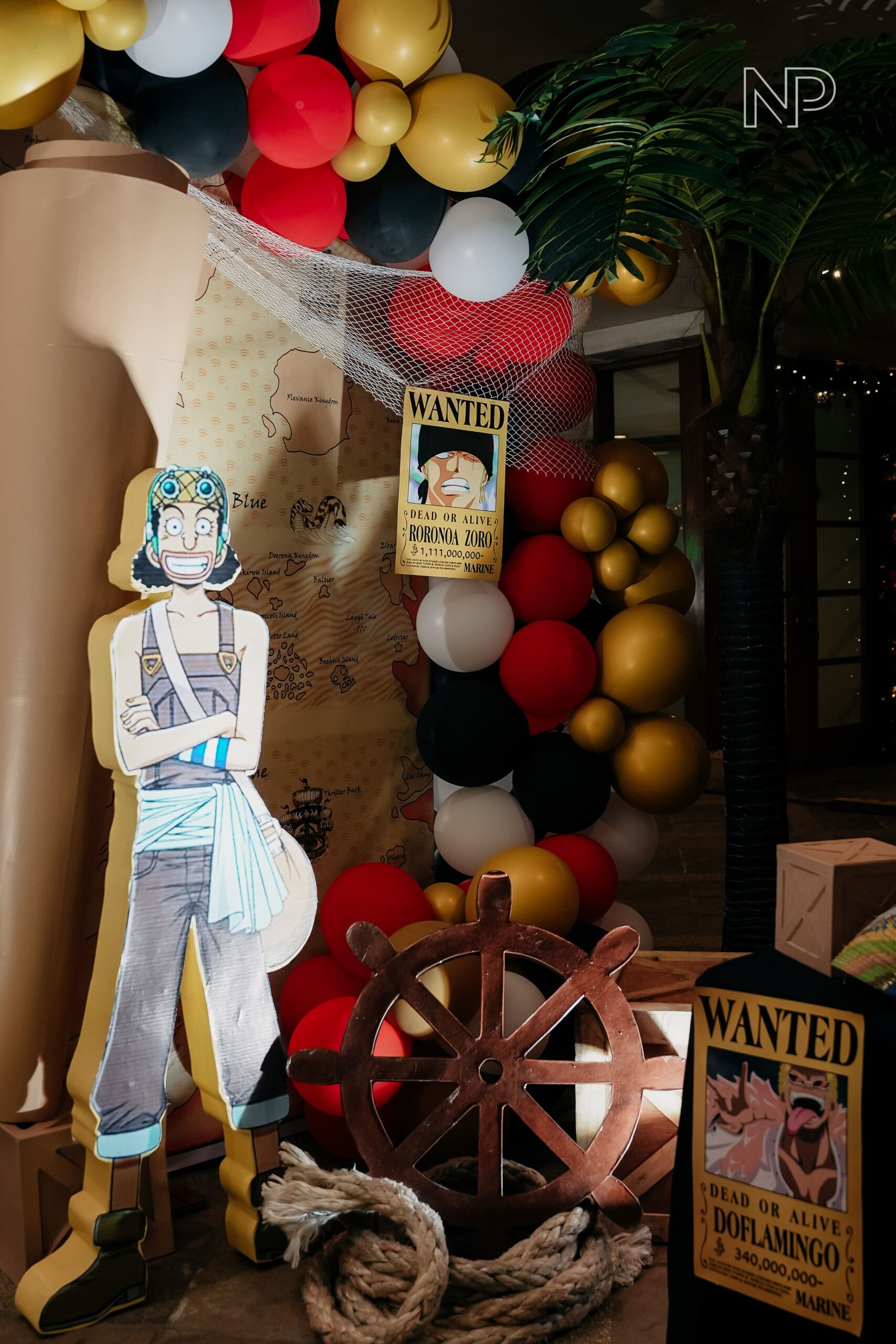 One Piece themed party decor featuring pirate ship backdrops, anime character cutouts, and nautical-inspired styling. Expert event stylist in Metro Manila, Philippines, specializing in anime-themed parties, custom birthday setups, and creative event styling for kids and teens. Perfect for One Piece fans, children’s parties, and anime-inspired celebrations.