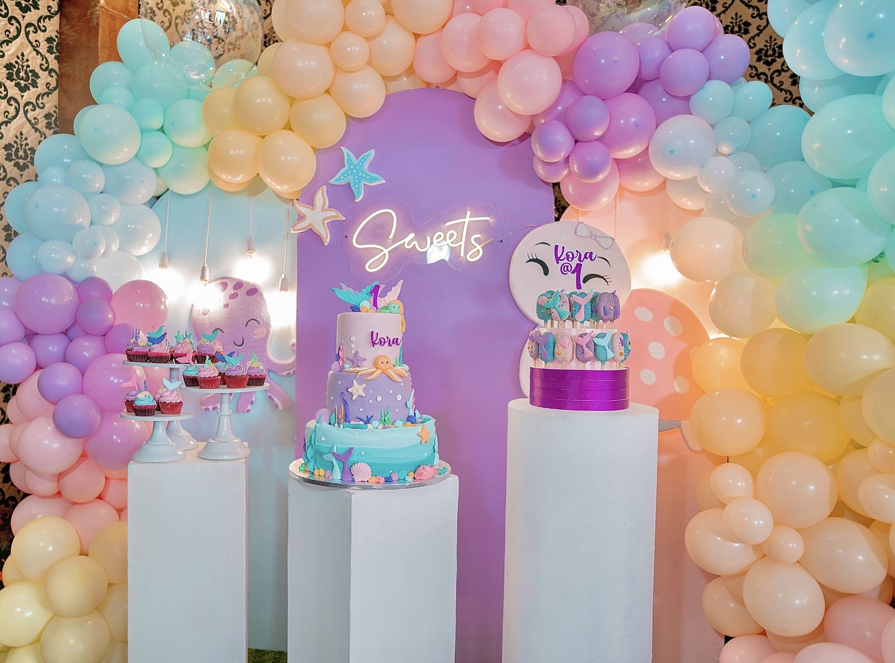 Under the Sea themed party decor featuring ocean-inspired elements, mermaid tails, seashells, and aquatic colors. Professional event stylist in Metro Manila, Philippines, specializing in underwater birthday themes, creative kids' party styling, and magical undersea celebrations. Perfect for mermaid parties, toddler birthdays, and ocean-themed events - Party Curators
