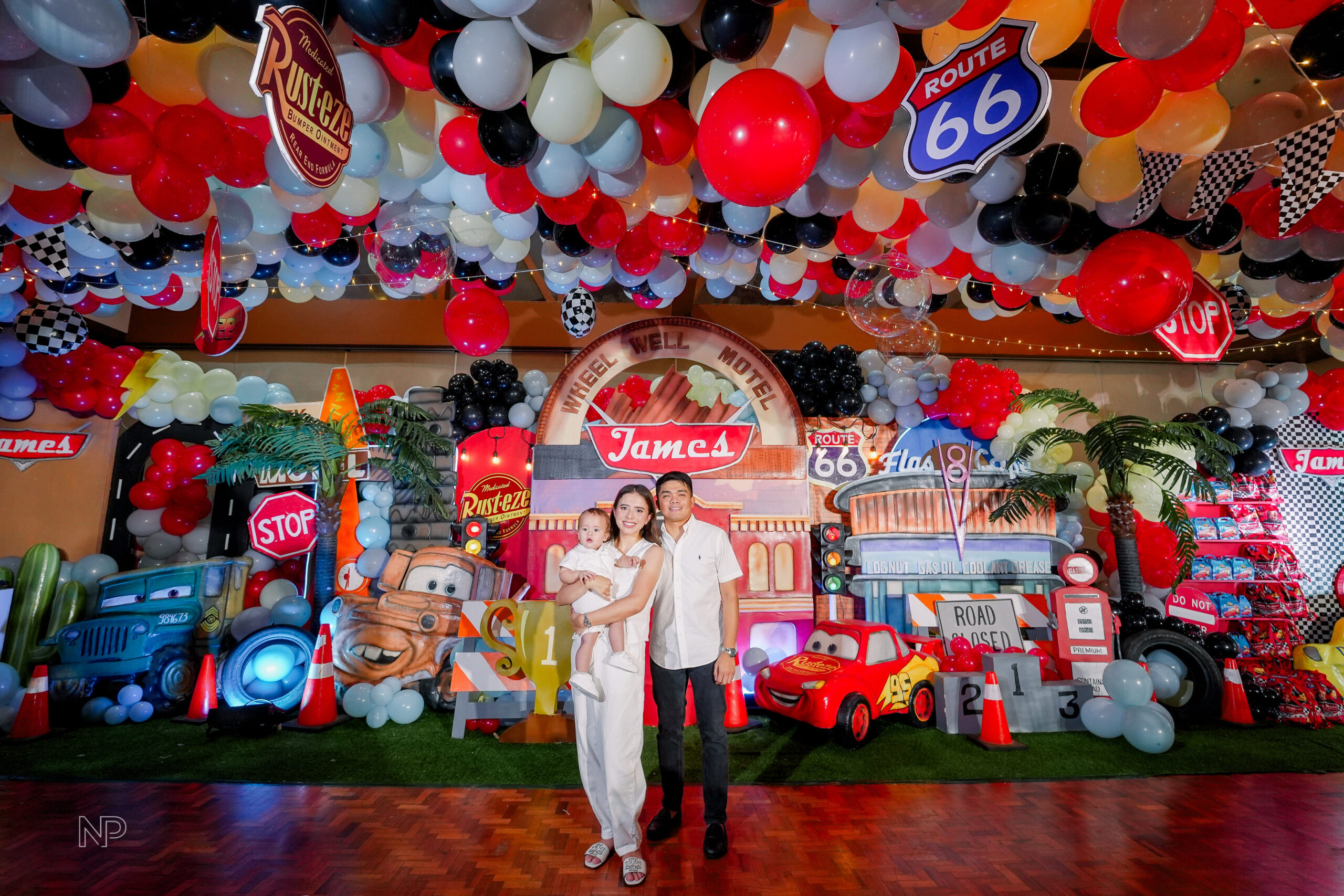 Disney Cars-themed party setup with Lightning McQueen, Mater, and race track decoration in the philippines | Party Curators