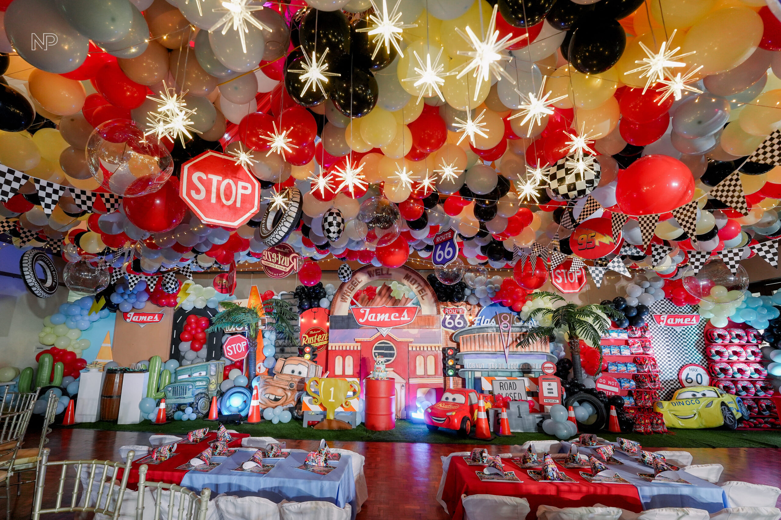 Disney Cars-themed party setup with Lightning McQueen, Mater, and race track decoration in the philippines | Party Curators