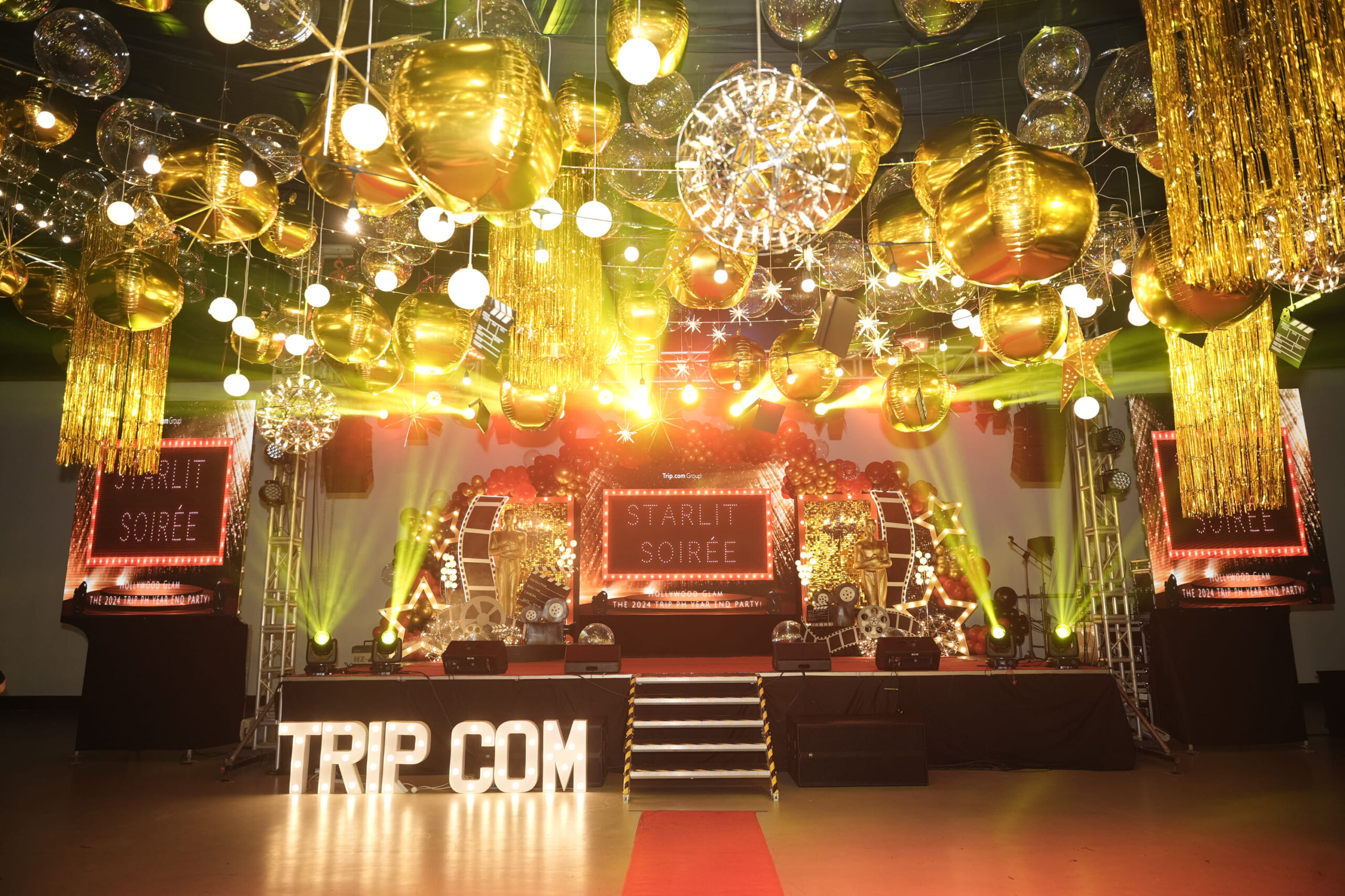 Corporate event styling for Trip.com with elegant decor, professional event coordination, and modern theme designs. Expert event planner for corporate conferences, company celebrations, and business functions. Stylish corporate event setup with branding, lighting, and unique themes.