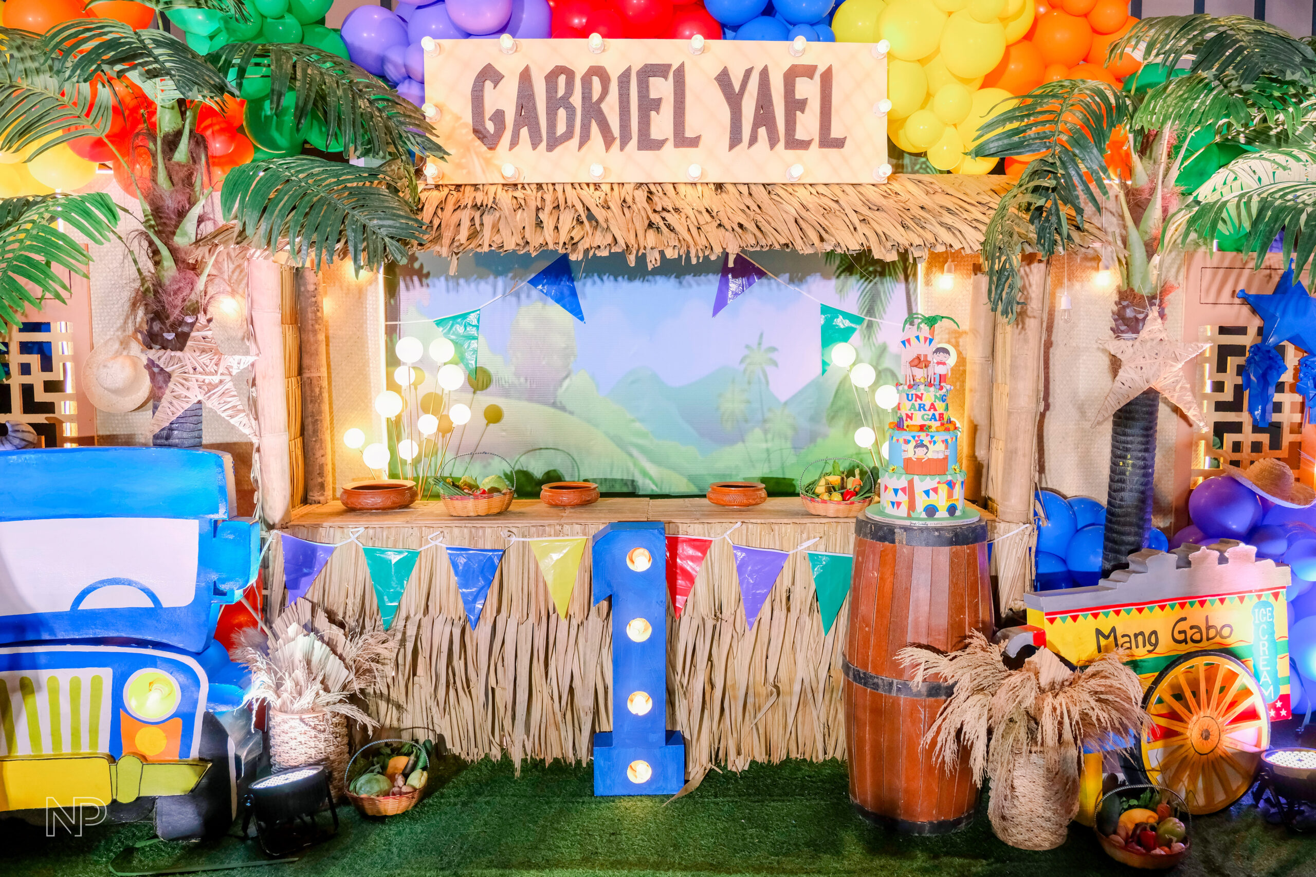 Creative Filipino-themed kiddie party setup featuring bamboo decorations, abaca accents, and colorful Filipino motifs"