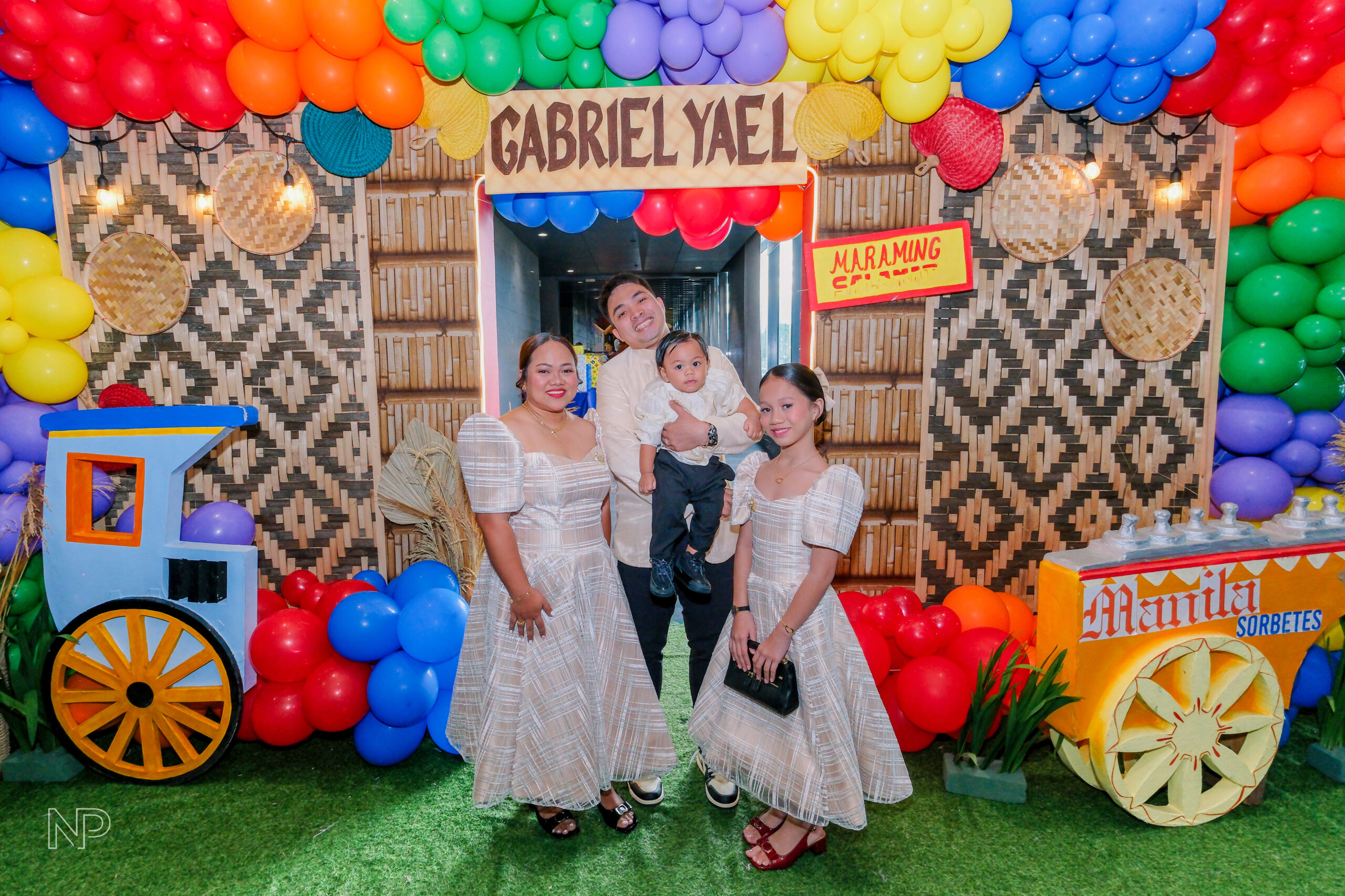 Creative Filipino-themed kiddie party setup featuring bamboo decorations, abaca accents, and colorful Filipino motifs"