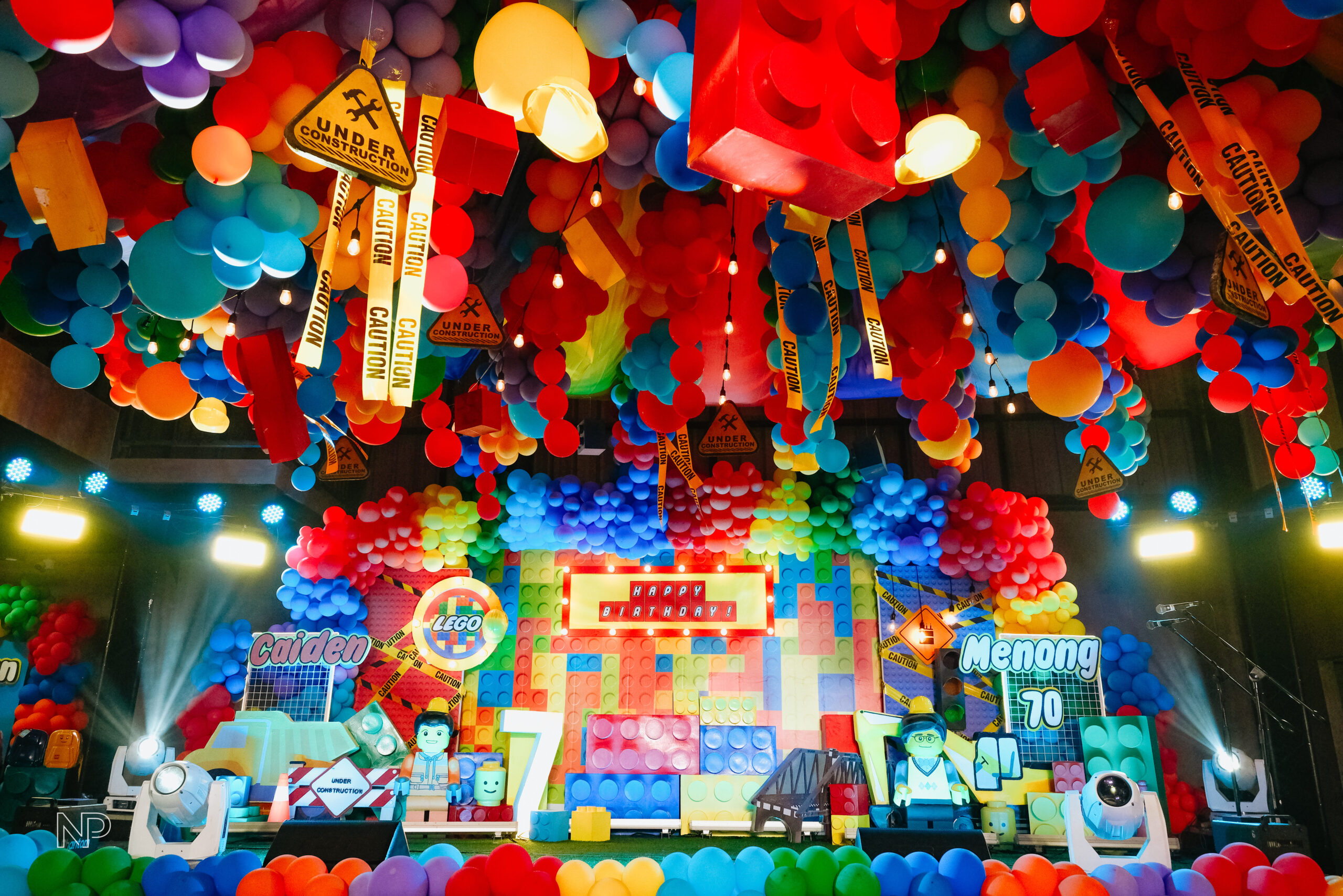 Creative Lego-themed party setup in the Philippines with colorful brick decorations, balloon arches, and character displays
