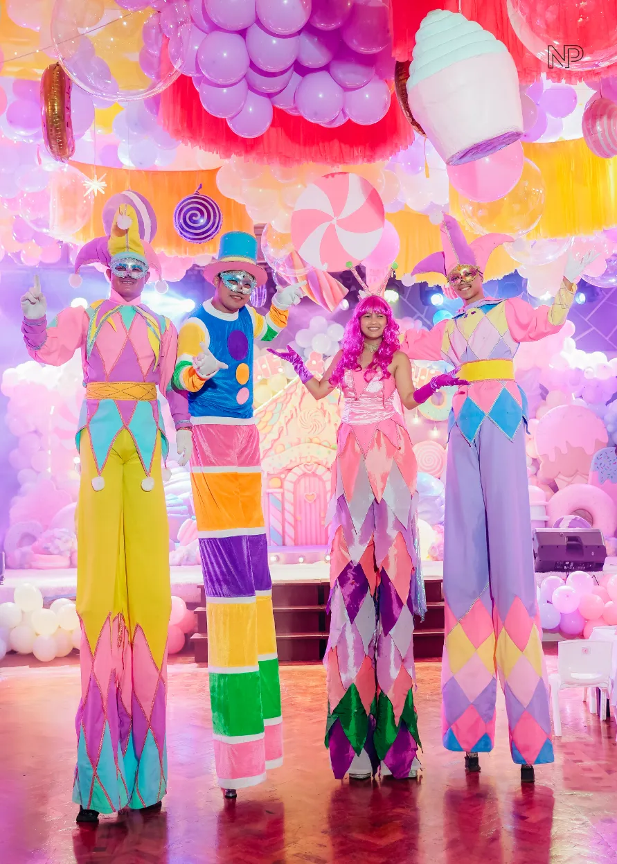 Pastel candy themed birthday party with donuts, lollipops and ice cream decorations