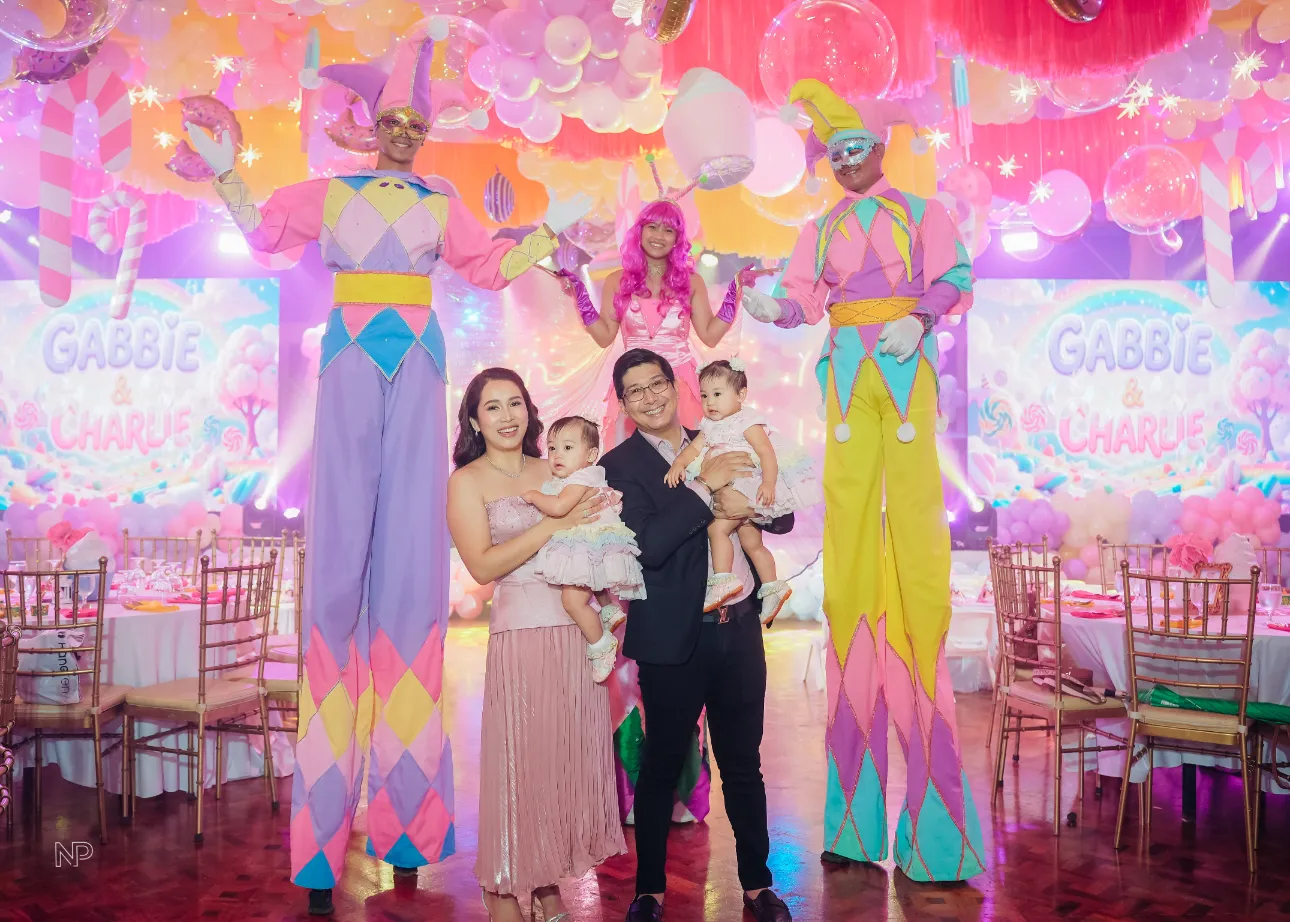 Kids Candyland birthday party with colorful balloons and sweet shoppe styling