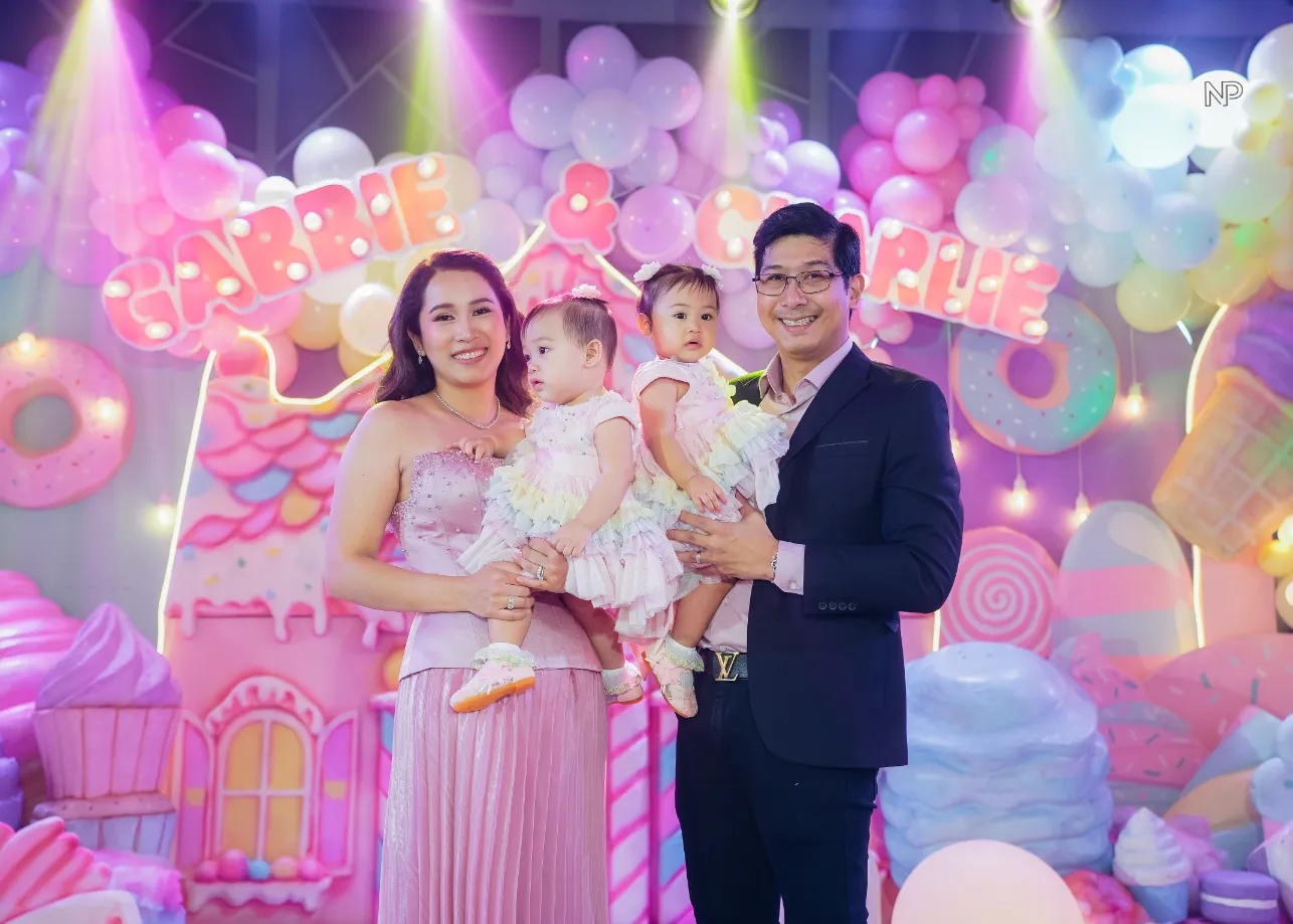 Kids Candyland birthday party with colorful balloons and sweet shoppe styling