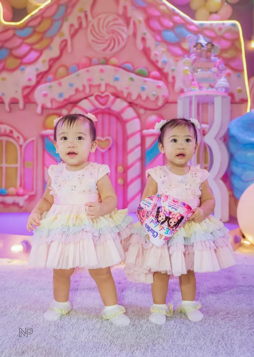 Pastel candy themed birthday party with donuts, lollipops and ice cream decorations