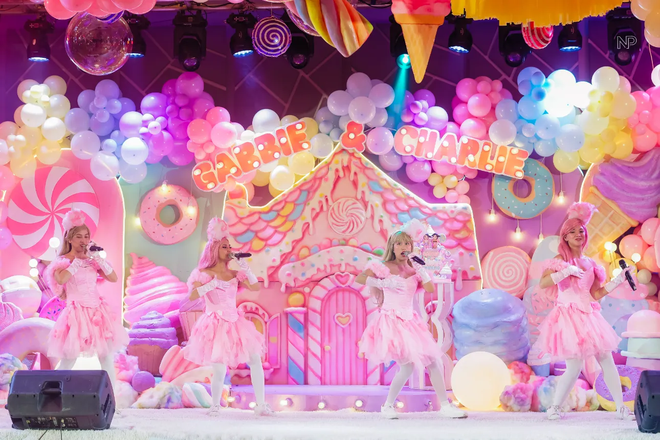 Pastel candy themed birthday party with donuts, lollipops and ice cream decorations