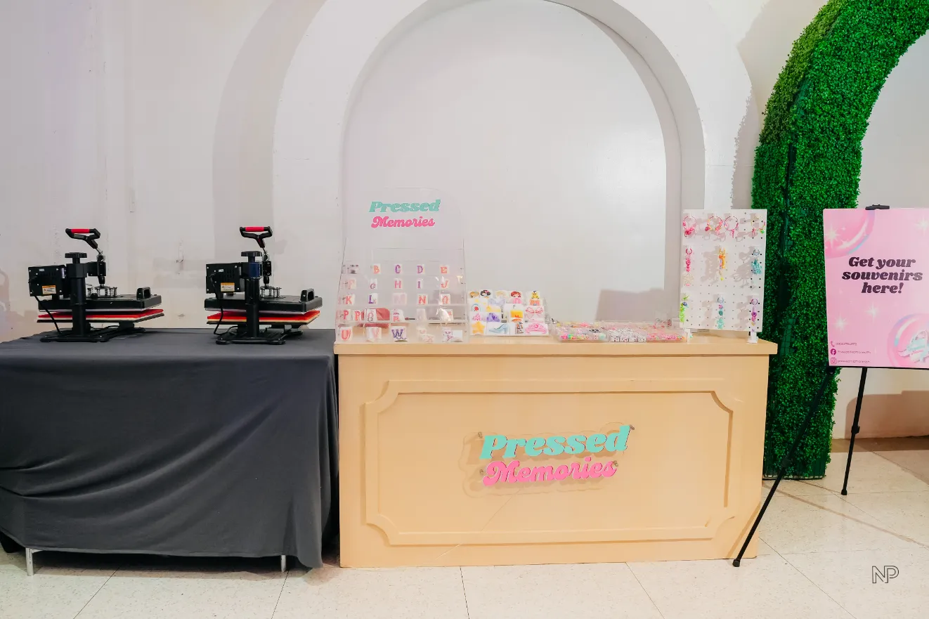 Pink princess castle birthday party with balloons, flowers and fairytale decorations